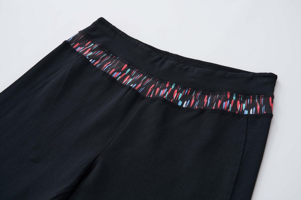 Dámské tepláky Wolf s elastanem T2571A černé s barevným pasem