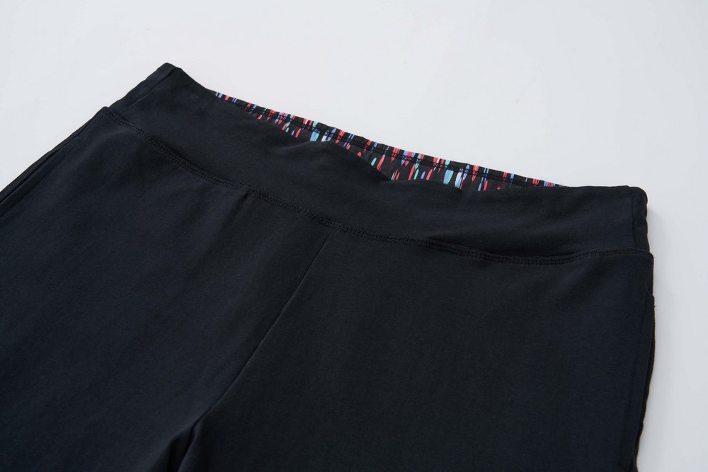 Dámské tepláky Wolf s elastanem T2571B vel. XL černé se 2 kapsami