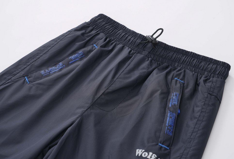 Dětské šusťáky Wolf s látkovou podšívkou T2551 tmavě modré (PRO HUBENÉ DĚTI)