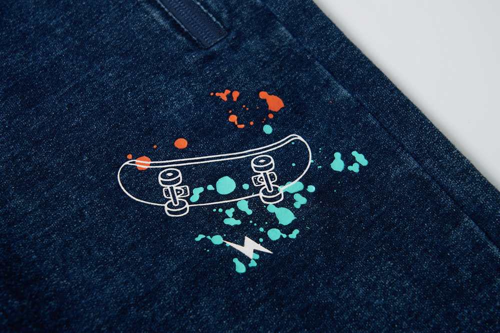 Sportovní kalhoty Wolf T2562B - imitace rifloviny modré