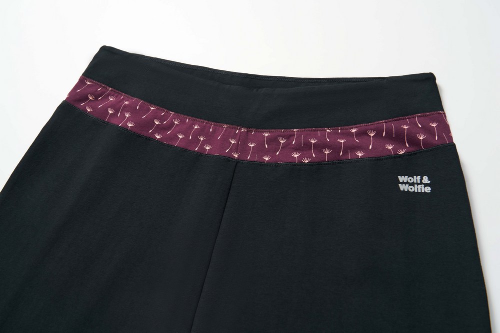 Dámské tepláky Wolf & Wolfie T2671A černé pampelišky na bordo podkladu