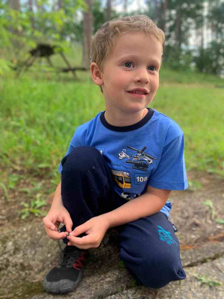 Chlapecké tepláky bavlněné petrolejové tmavé s vrtulníkem