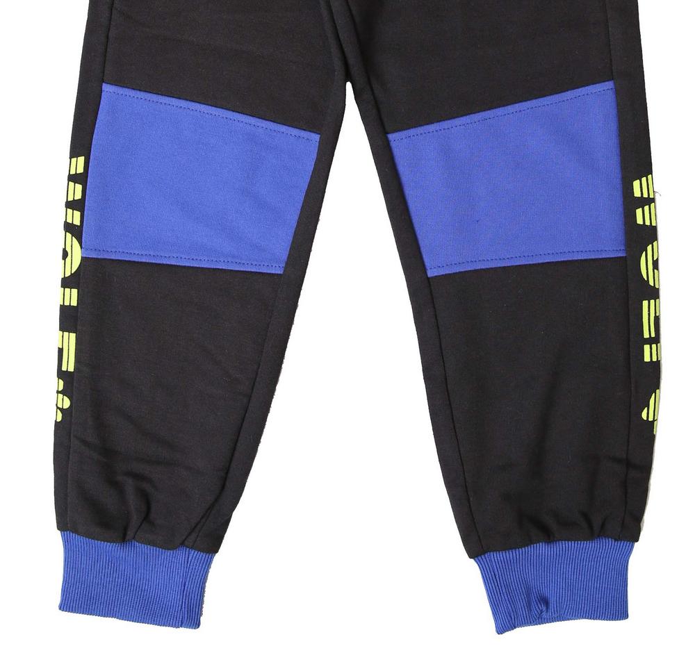 Sportovní chlapecké tepláky Wolf T2177C vel. 104-134 černé