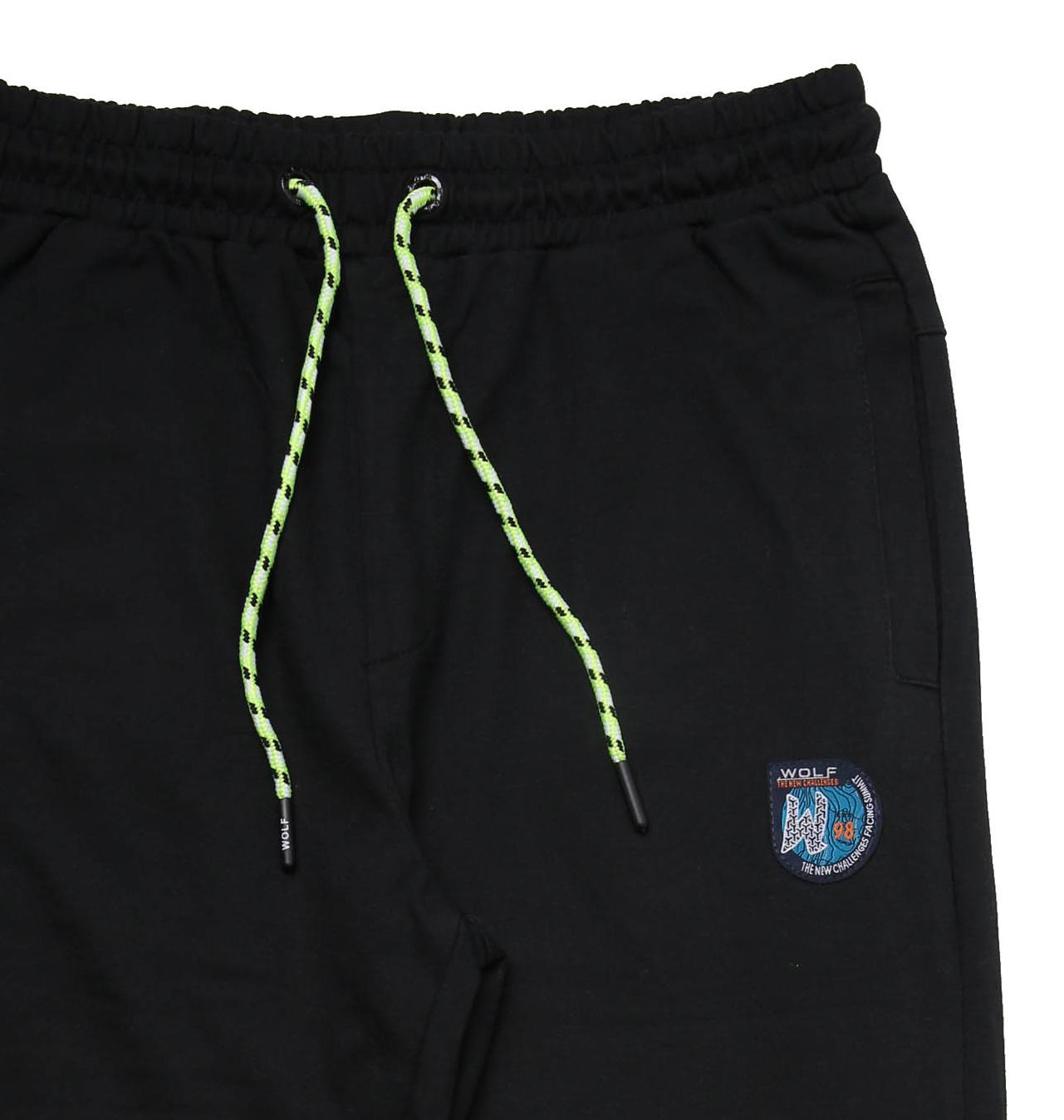 Sportovní chlapecké tepláky Wolf T2276D vel. 164-176 černé