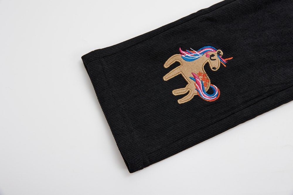 Dívčí ZATEPLENÉ manšestrové kalhoty Wolf T2425 černé s jednorožcem