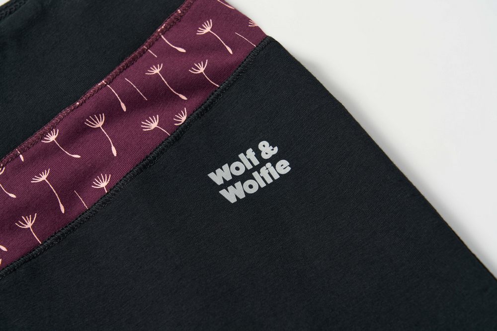 Dámské tepláky Wolf & Wolfie T2671A černé pampelišky na bordo podkladu