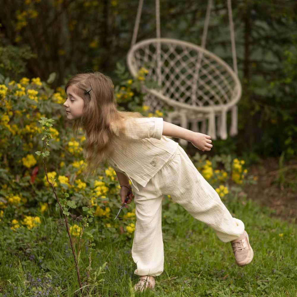 Dětské mušelínové kalhoty Esito Luca smetanové