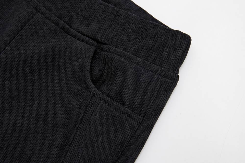 Dívčí ZATEPLENÉ manšestrové kalhoty Wolf T2425 černé s jednorožcem