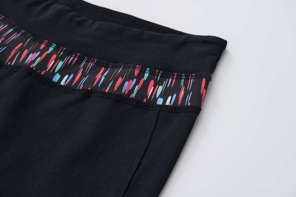 Dámské tepláky Wolf s elastanem T2571A černé s barevným pasem