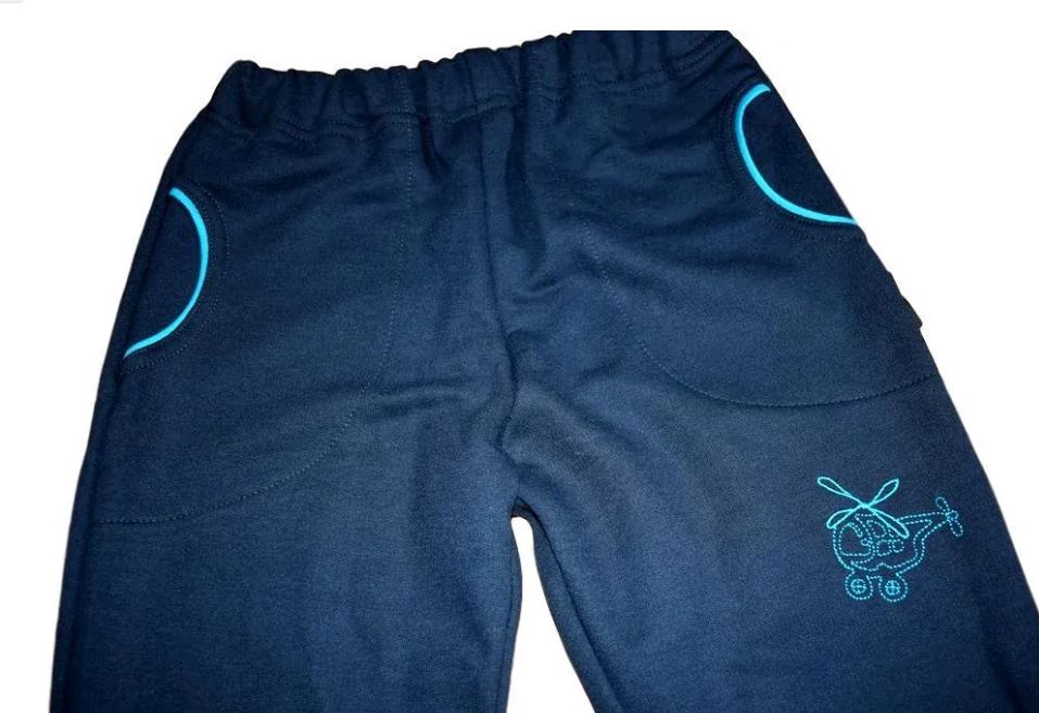 Chlapecké tepláky bavlněné petrolejové tmavé s vrtulníkem