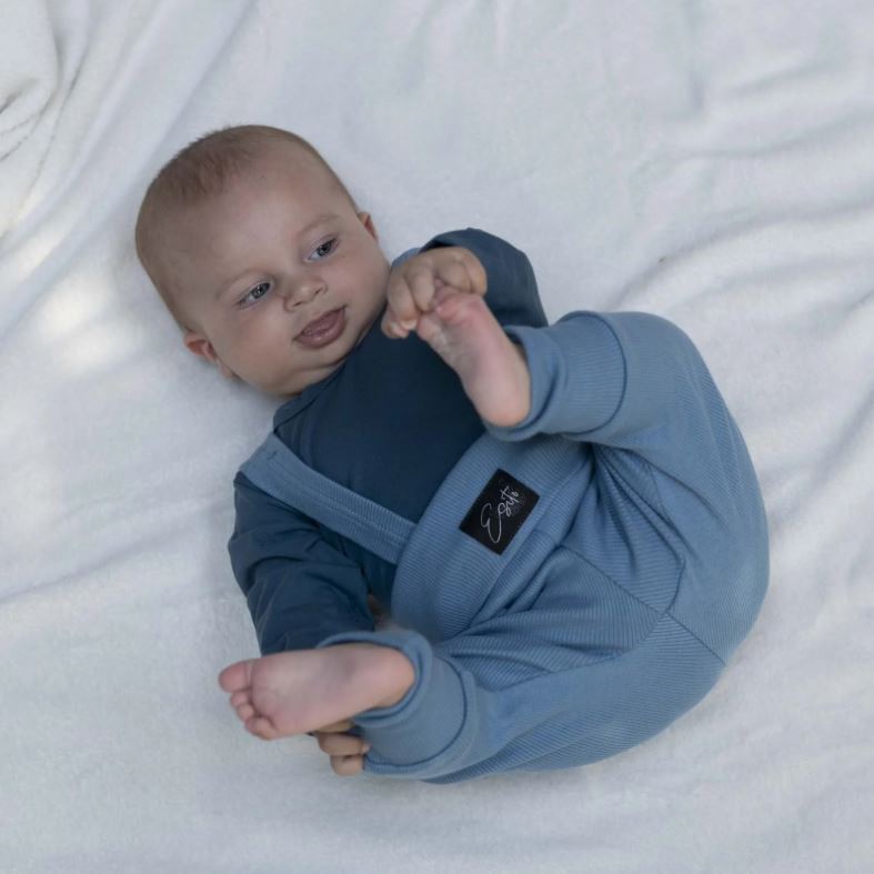 Rostoucí žebrované tepláčky Esito s kšandami modré